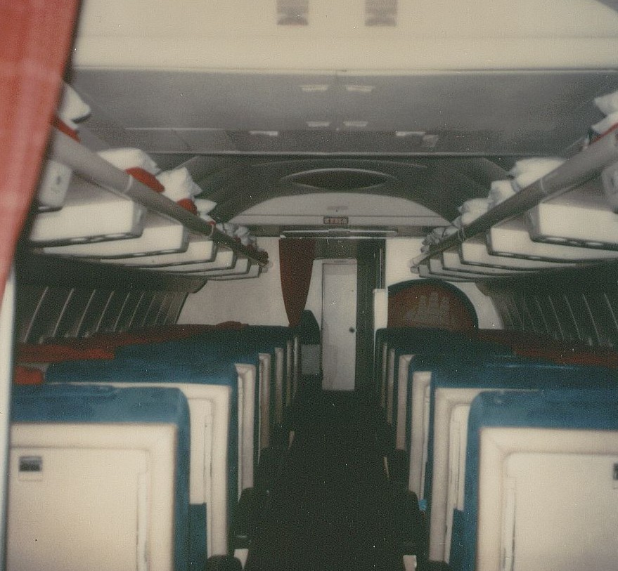 December 1978 a Pan Am Boeing 707 First Class cabin with 24 seats looking forward from the front of the economy section through First Class to the forward cockpit door.